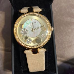 NEVER BEEN WORN Akribos XXIV women’s watch. Stainless steel backing.